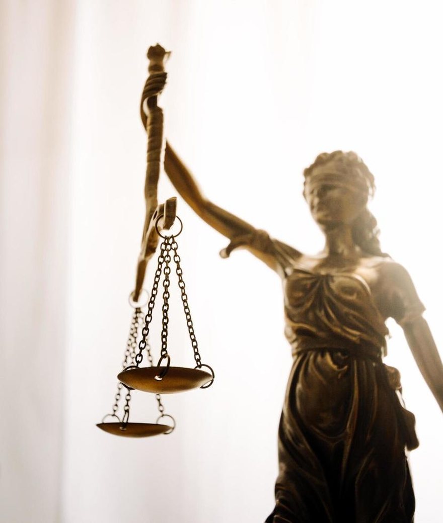 Scales of justice on an attorney's desk