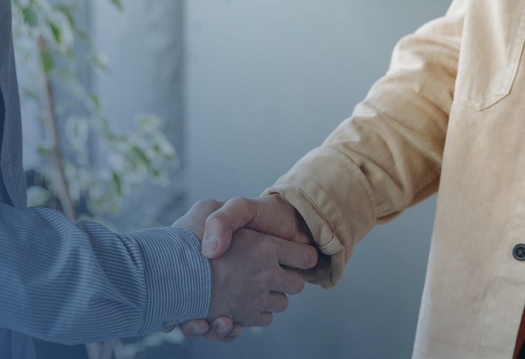 Two people shaking hands